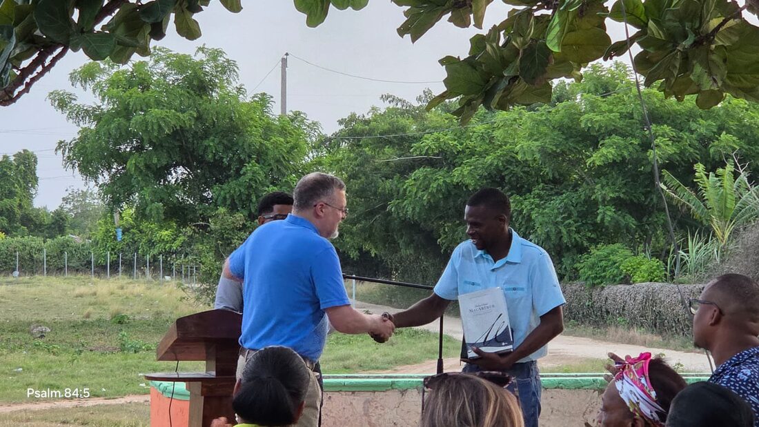Presenting a Study Bible to one of the pastors in the Dominican Republic.