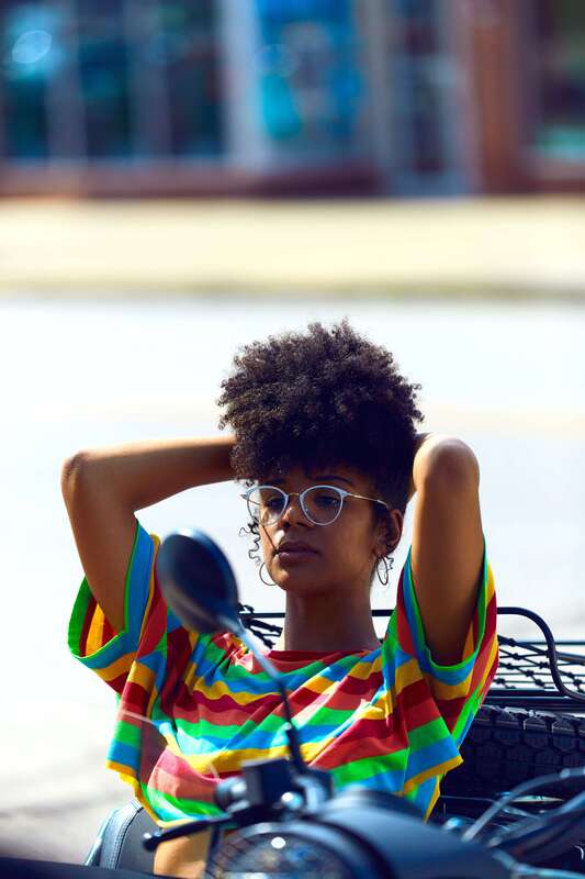 Photo of a young Black woman representing a Highly Sensitive client who has attending online therapy for HSPs through Sacred Circle Holistic Healing. Sacred Circle Holistic Healing is located in Lawrence, Kansas 66044.