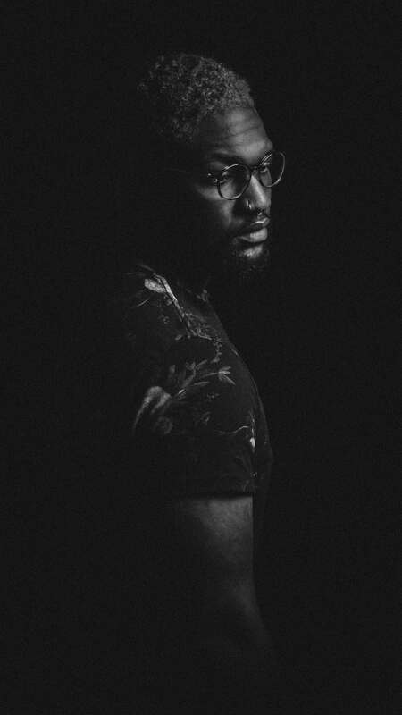 Black and white picture of a young Black man. This represents the clients that come to therapy with Maggie Jones Boyle, LPC.
