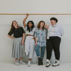 Picture of four people laughing. This resents that highly sensitive people like to socialize. Sacred Circle Holistic Healing offers counseling for highly sensitive adults in Kansas.