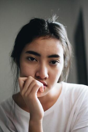 Young women staring into the camera. This illustrates that Sacred Circle Holistic Healing offers online therapy through out the state of Kansas for young women with low self-esteem and anxiety.
