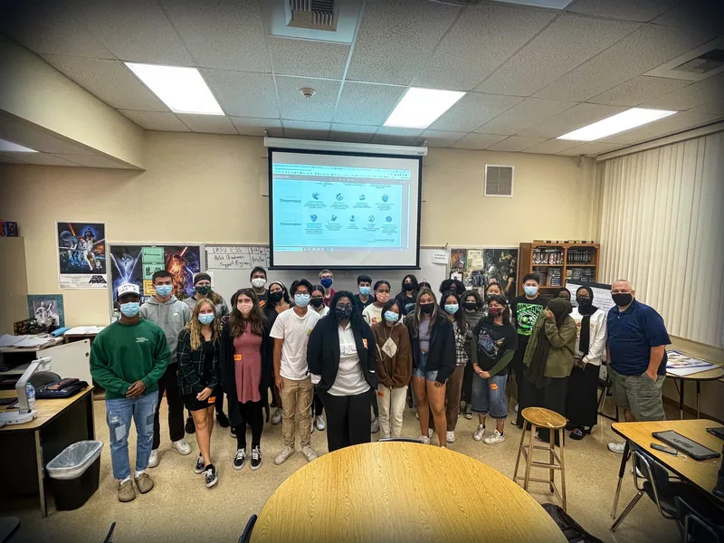 Dr. LaNysha Adams with a group at an interactive workshop