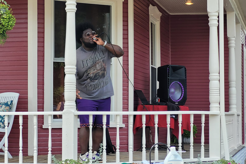TINO performing hip-hop and rap music at the Troy Ohio Porch Fest