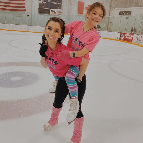 Coach Kiana with Skate Squad assistant Izzy!