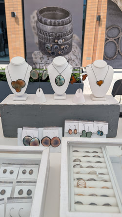a jewelry display at a craft show