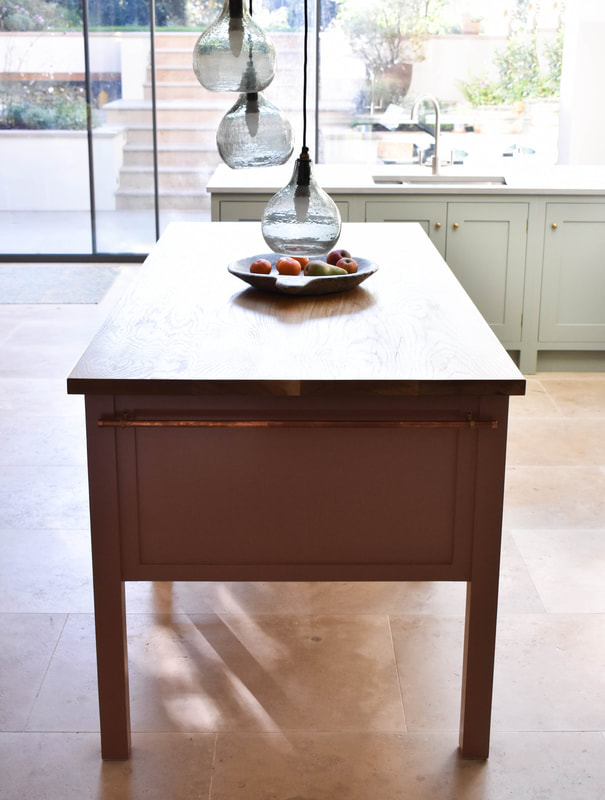 Solid timber bespoke handmade timber kitchen island in Kentish Town North London designed made and fitted 