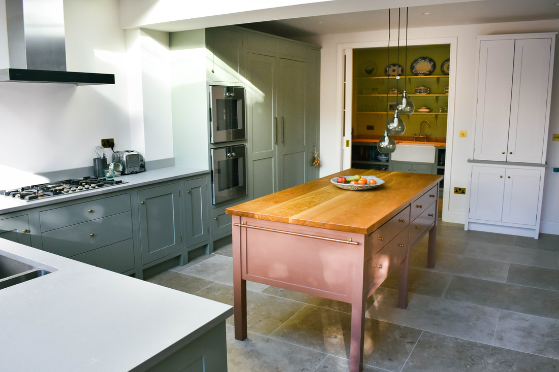 Solid timber bespoke handmade timber kitchen island in Kentish Town North London designed made and fitted 