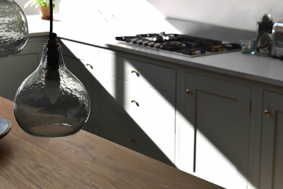 Solid timber bespoke handmade timber kitchen island in Kentish Town North London designed made and fitted 