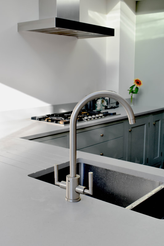 sink and taps in handmade solid wood kitchen in North London