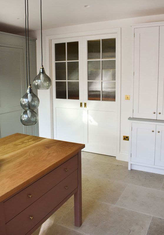 Solid oak full stave iak worktop on kitchen island in North London