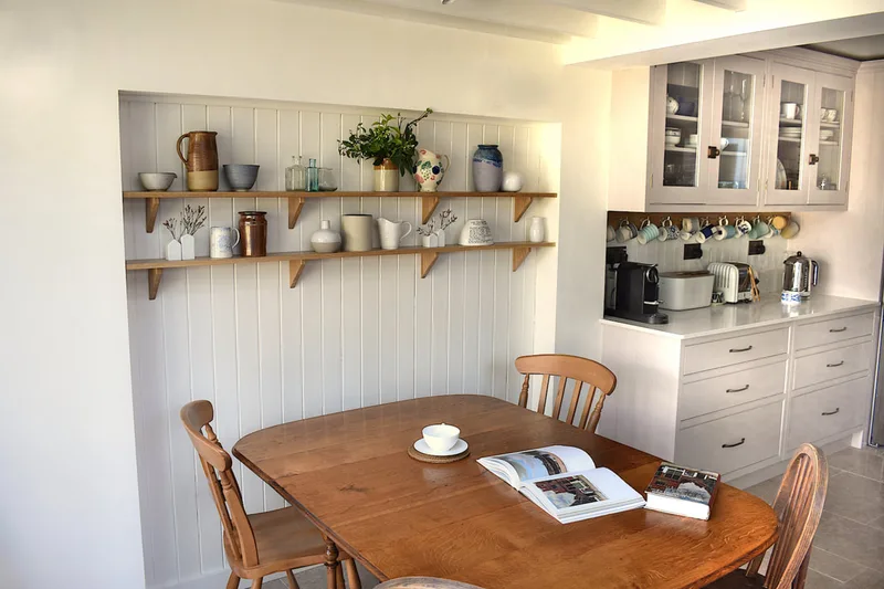 Solid oak shelves in contemporary shaker kitchen North London