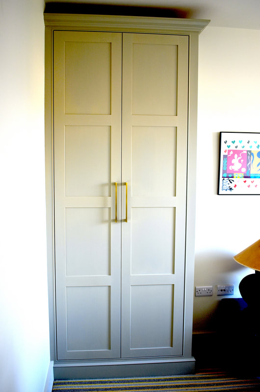 Elegant panelled door 2 wardrobe with interior drawers  in North London
