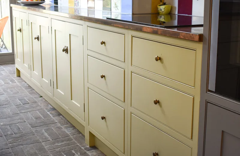 Hand painted shaker framed cabinets with 'quirk and bead' frame on panelled shaker kitchen in Barnet North London