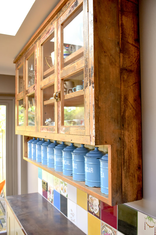 Reclaimed wood glazed cabinet in  handmade panelled shaker kitchen in Barnet North London