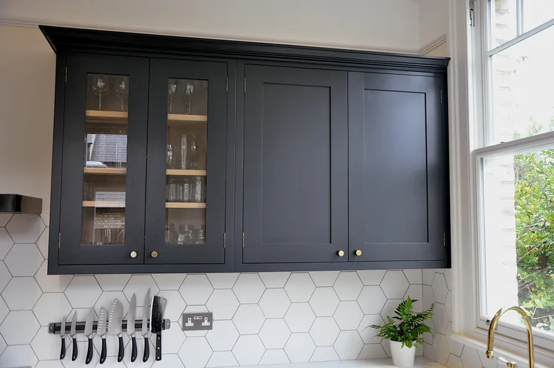 Glazed wall cabinets in Reclaimed wood hand painted shaker framed kitche in Barnet North London with reclaimed island