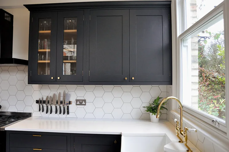 Glazed wall cabinets in hand painted shaker framed kitche in Barnet North London with reclaimed island 