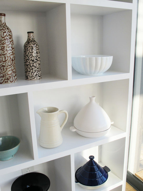 Bespoke shelving in contemporary studio living space North London