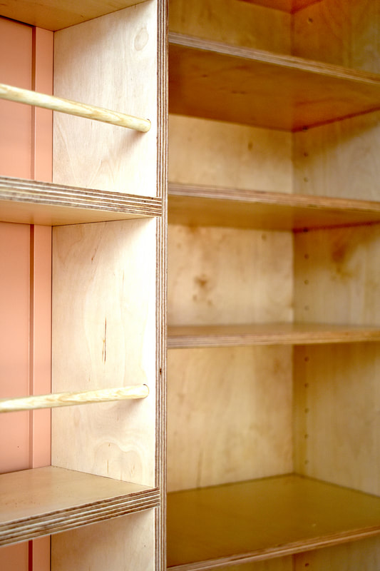 Birch ply door mounted shelving in a larder cabinet North London