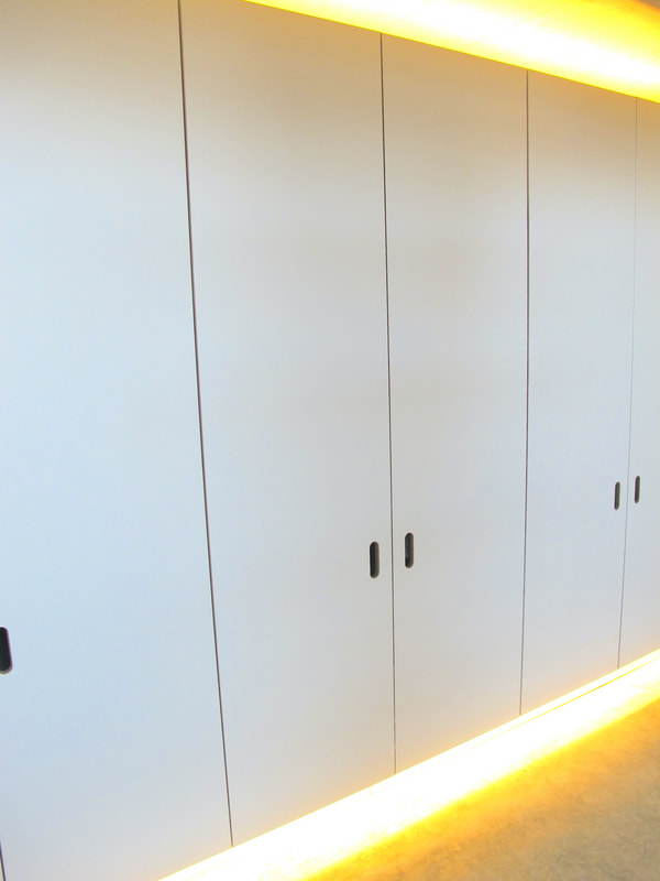 Wardrobes  in contemporary studio living space  in North London