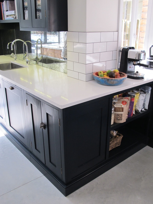Painted bespoke kitchen in Muswell Hill North London. Solid timber panelled shaker doors and reclaimed timber island.