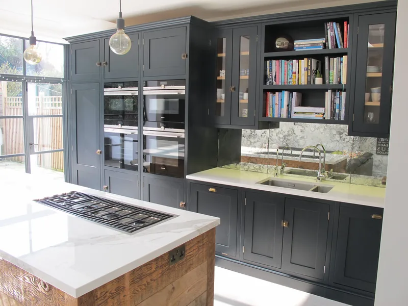 Painted bespoke kitchen in Muswell Hill North London. Solid timber panelled shaker doors and reclaimed timber island.