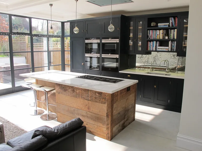 Painted bespoke kitchen in Muswell Hill North London. Solid timber panelled shaker doors and reclaimed timber island.