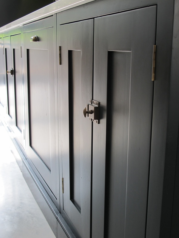 Painted bespoke kitchen in Muswell Hill North London. Solid timber panelled shaker doors and reclaimed timber island.