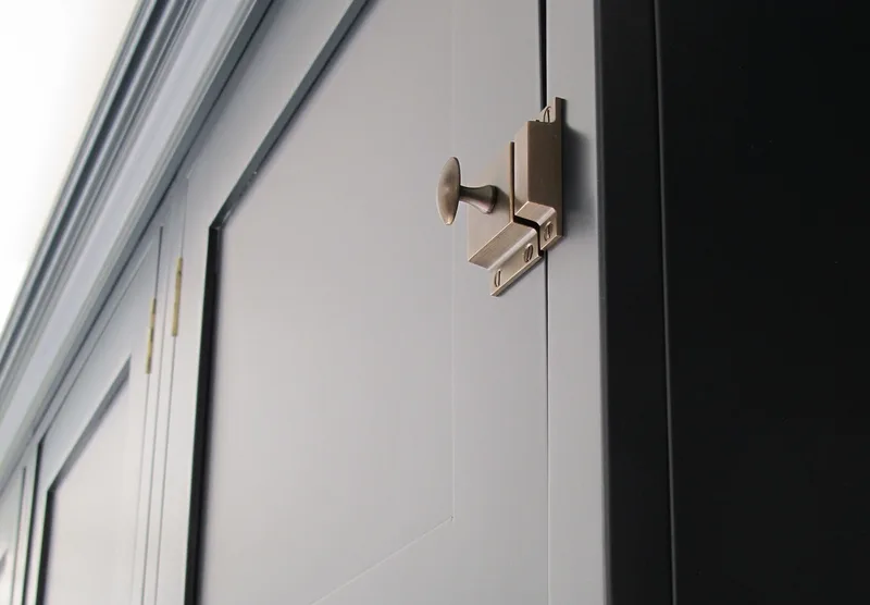 Painted bespoke kitchen in Muswell Hill North London. Solid timber panelled shaker doors and reclaimed timber island.