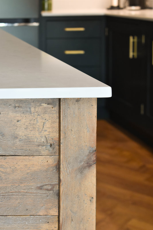 Reclaimed island in mixed solid hand painted timber and reclaimed wood kitchen in a new extension in Hertfordshire 