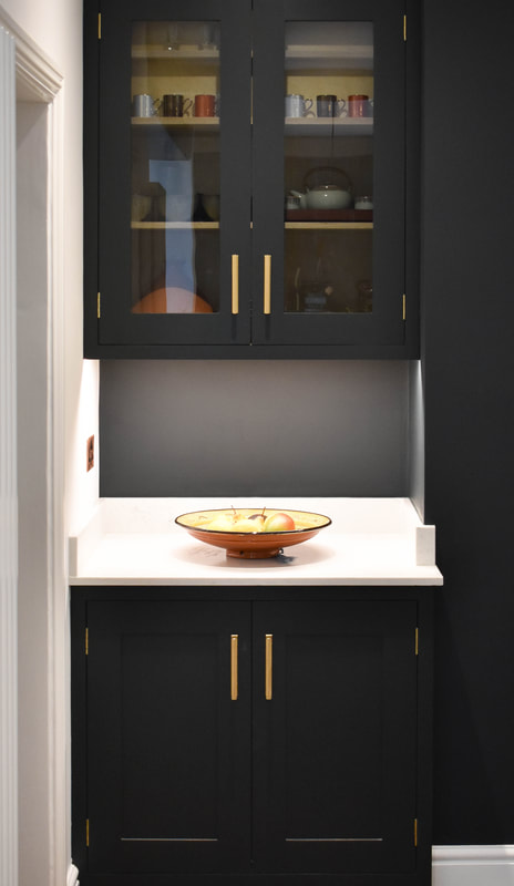 antique brass pulls on mixed solid hand painted timber and reclaimed wood kitchen in a new extension in Hertfordshire 