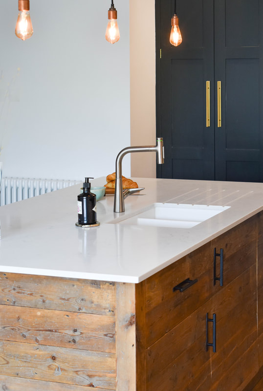Reclaimed wood kitchen island Mixed solid hand painted timber and reclaimed wood kitchen in a new extension in Hertfordshire 