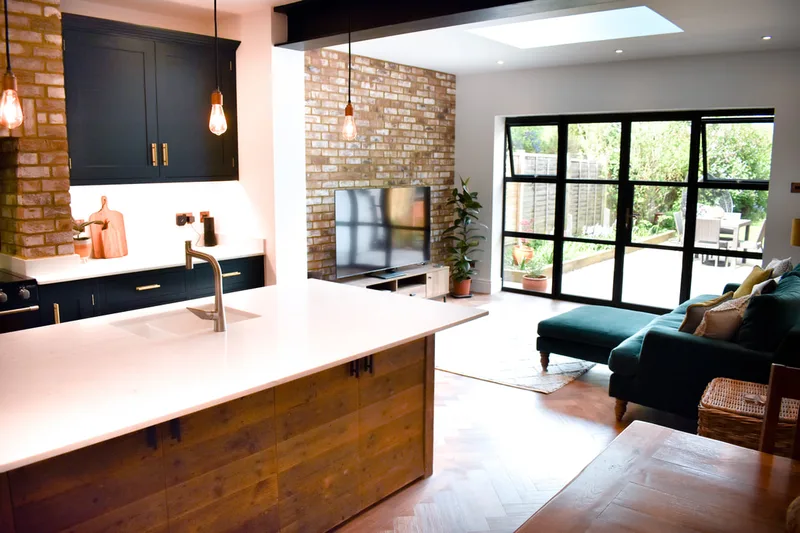 Mixed solid hand painted timber and reclaimed wood kitchen in a new extension in Hertfordshire 