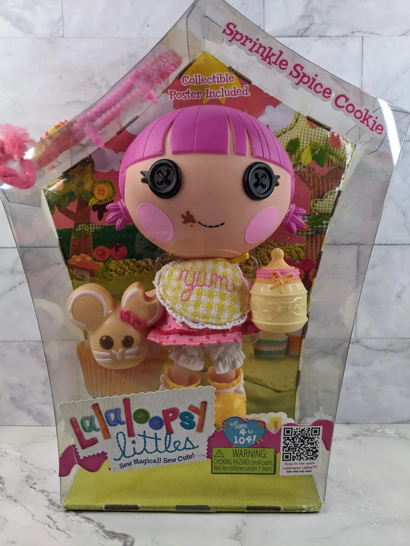 A Lalaloopsy Littles Doll, about 8 inches tall, Sprinkle Spice Cookie, new in its original box.