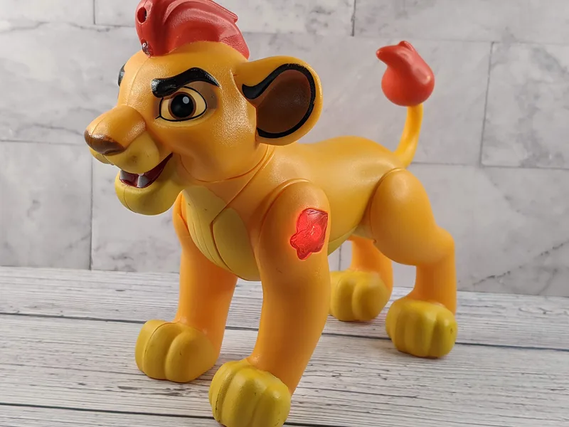 A lion action figure toy that lights up and has sound, Kion of the Lion Guard, Pride Land Brawlers toy.