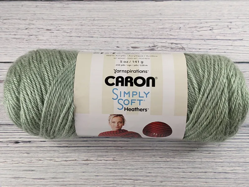 Caron Simply Soft Woodland Heather green yarn skein.