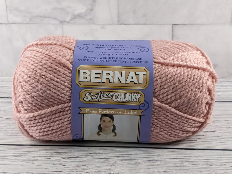 Bernat Softee Chunky skein of yarn in pale antique rose color.