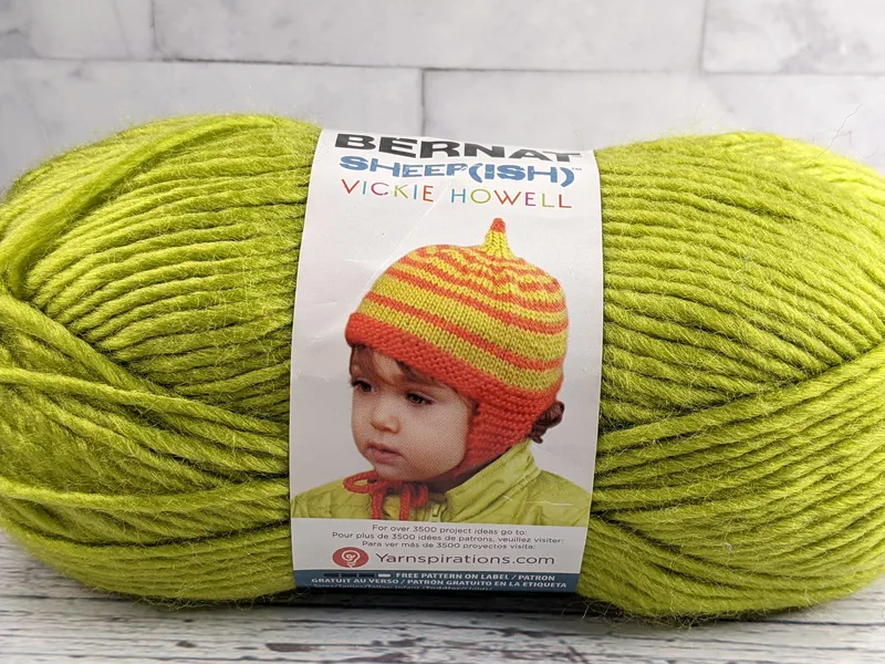 Bright green chartreuse skein of yarn.