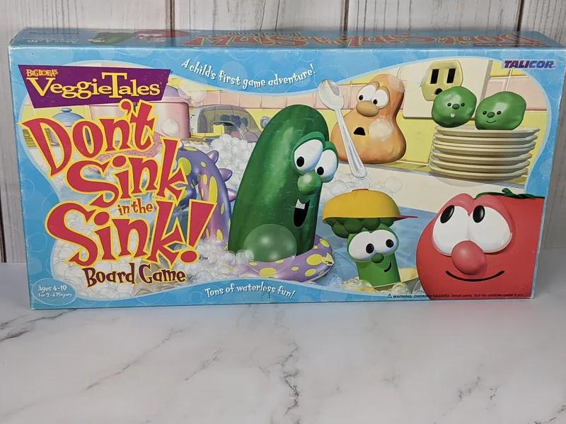 A VeggieTales board game in a box, called "Don't Sink in the Sink!"