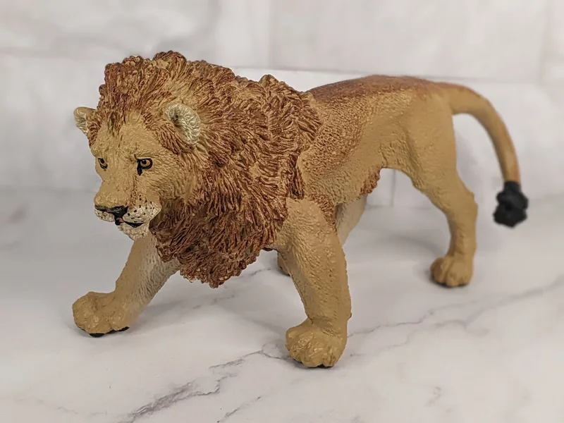 The Vanishing Wild Male Lion Figurine