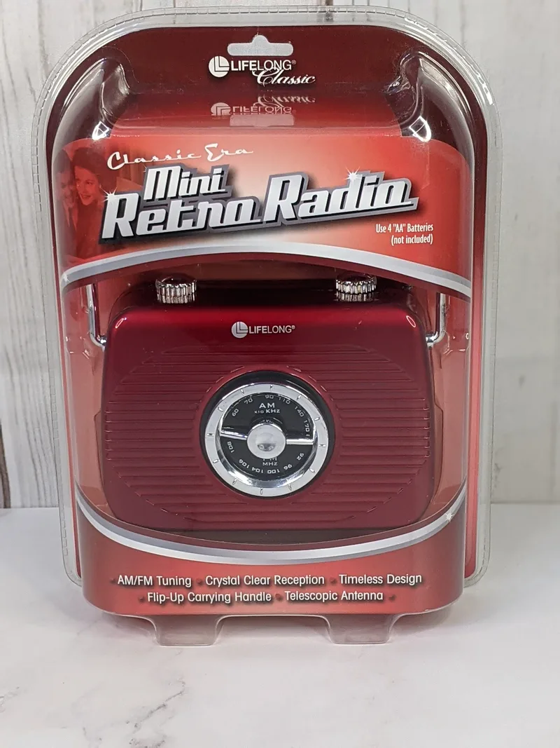 A red retro AM/FM radio in its original package.