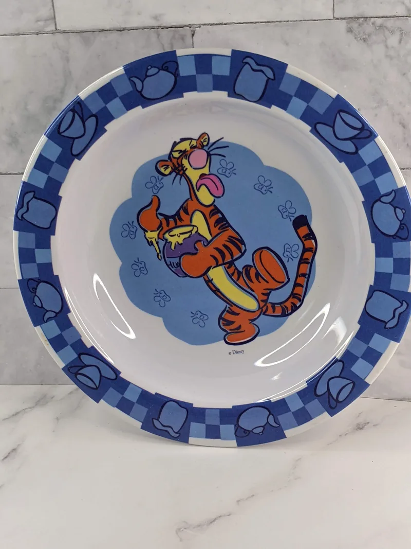 A vintage 1990's cereal bowl with an image of Tigger from Disney's Winnie the Pooh series.