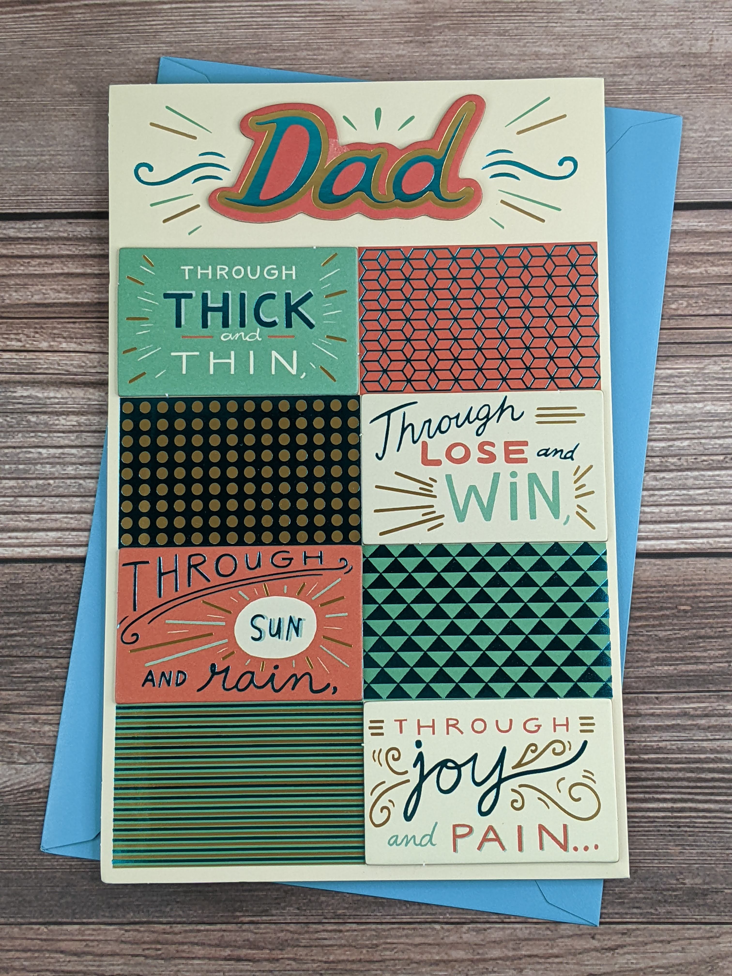 A Father's Day greeting card with dimensional rectangle embellishments featuring words and geometric patterns.
