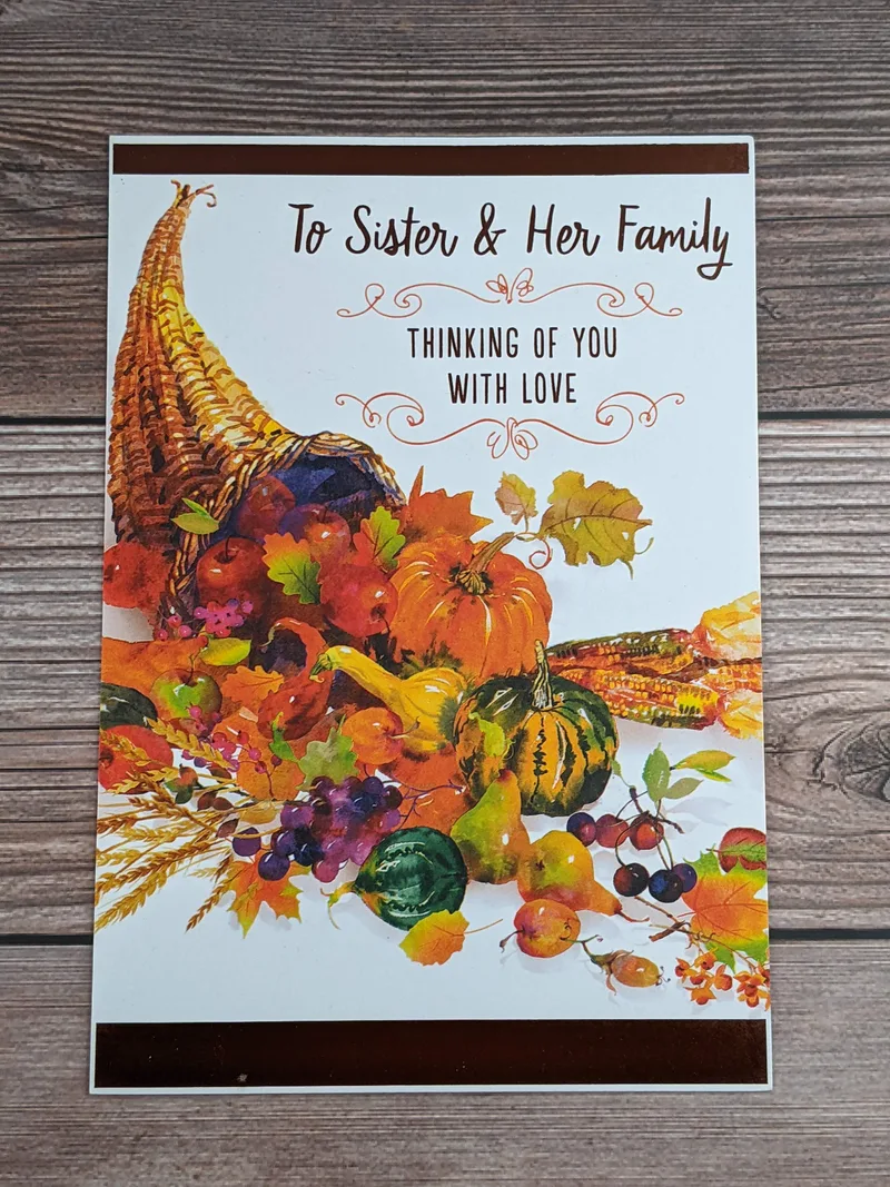 A sister thanksgiving card with an image of a cornucopia.