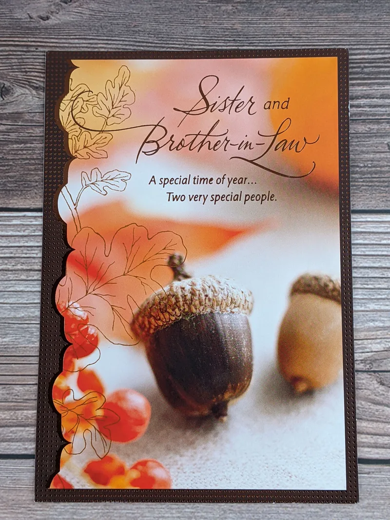 A thanksgiving card for a sister and brother-in-law with an image of acorns.