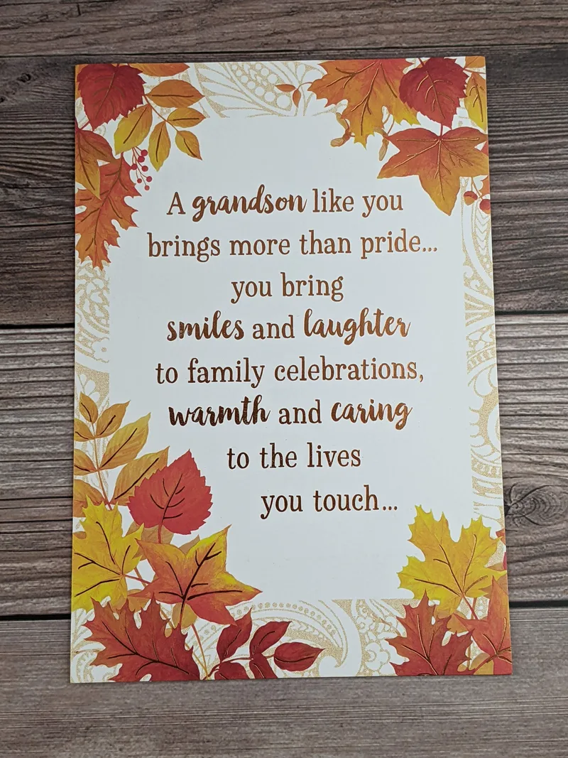 A thanksgiving card for a grandson with images of yellow and orange leaves.