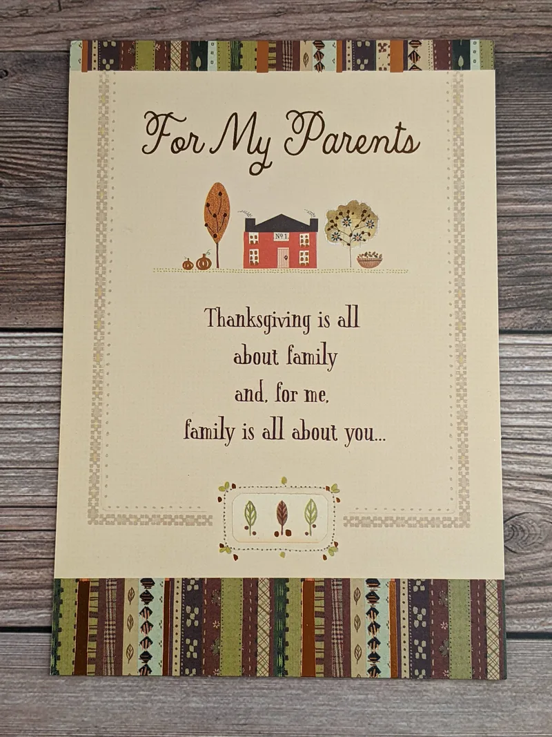 A thanksgiving card for someone's parents with autumn colors on the cover.