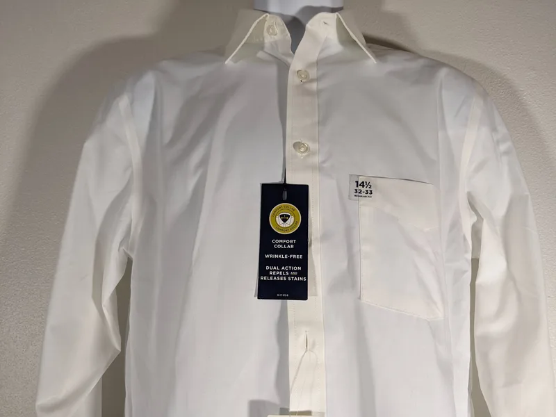 A Men's White Button-Down Travel Performance Super Shirt by Stafford. 