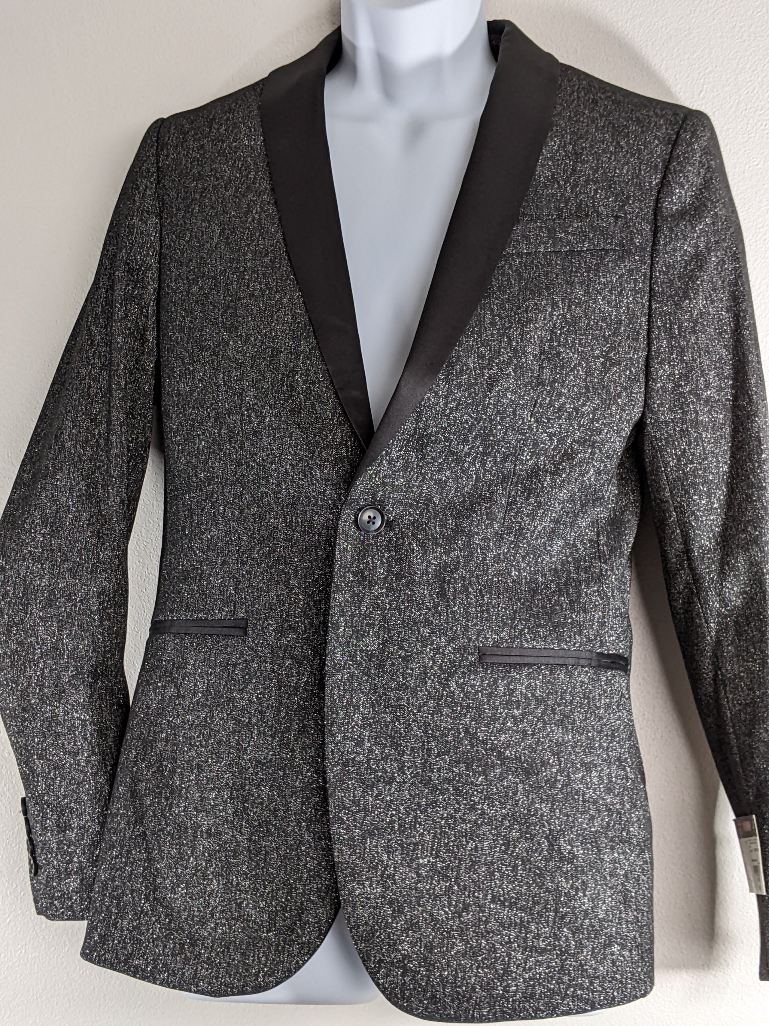 A charcoal color men's suit coat with sparkles by J. Ferrar.
