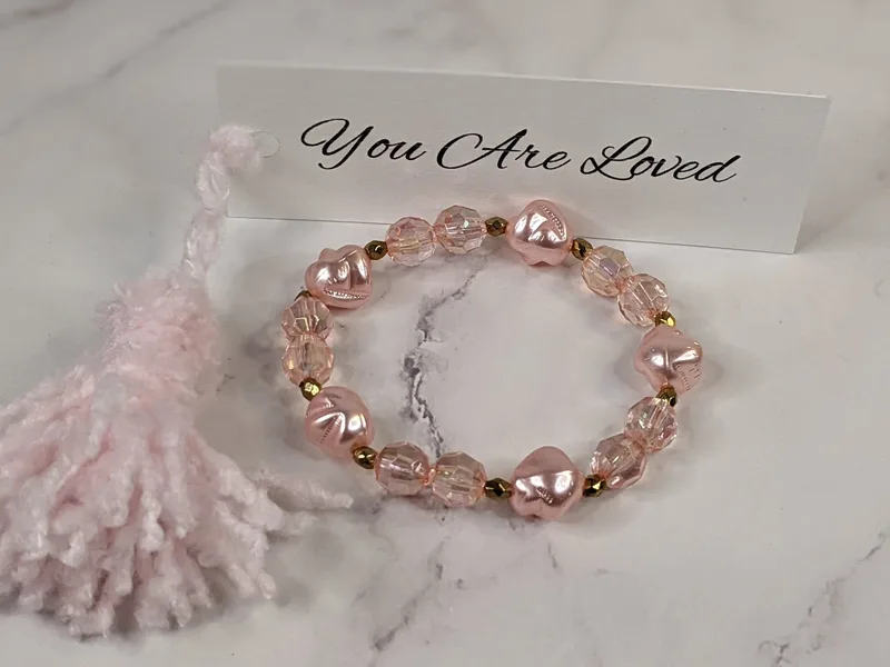 Pink Bracelet with You Are Loved Tag