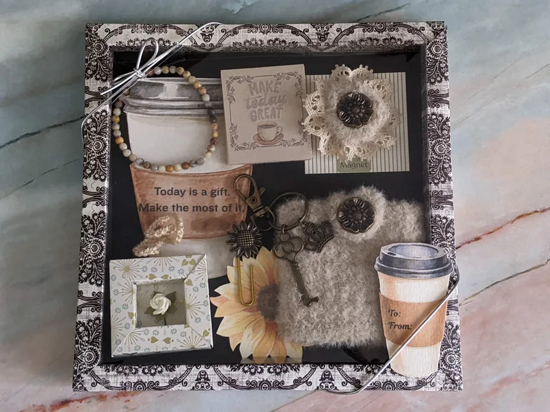 A gift set of handmade items in a handmade display box.